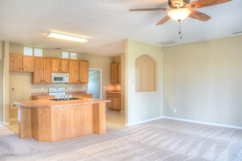 2110 Gandy Road Southwest Palm Bay, FL 32908 - Photo 9 of 18 kitchen & Living Room Combo