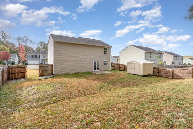 a house view with a backyard space