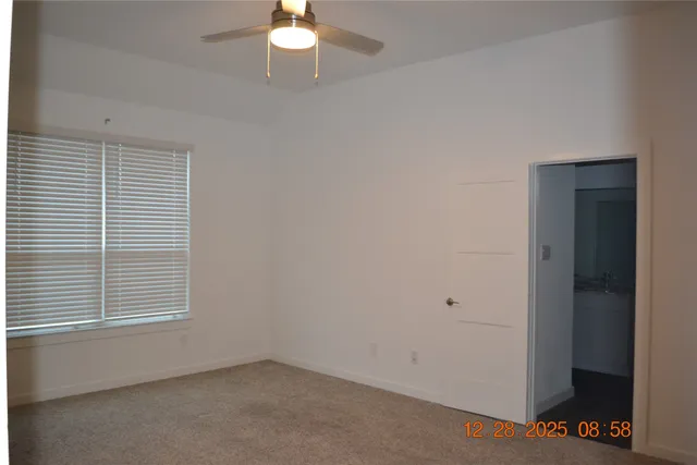 a bathroom with double sink and a mirror