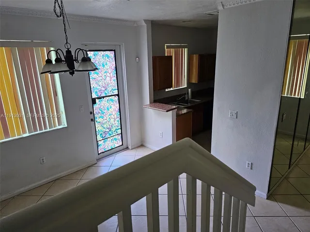 a bedroom with a bed and a window in it