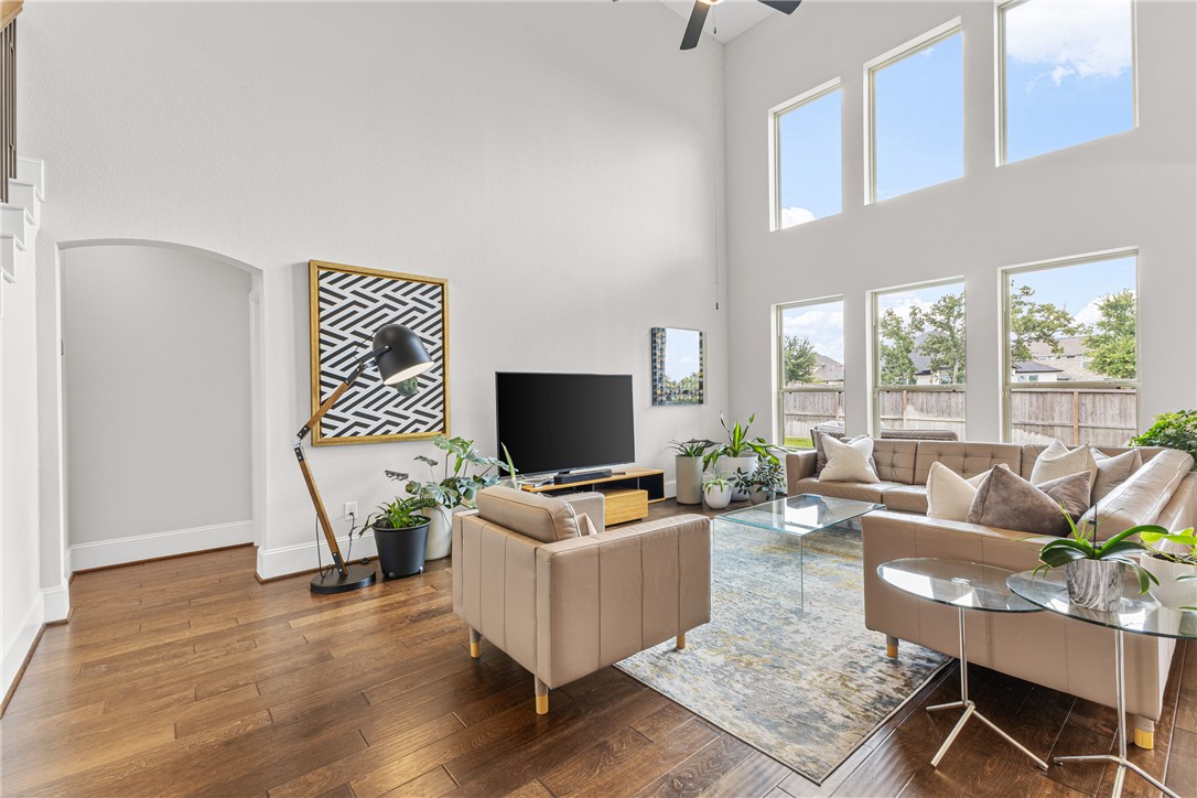 3632 Haskell Hollow Loop College Station, TX 77845 - Photo 13 of 42 a living room with furniture and a flat screen tv