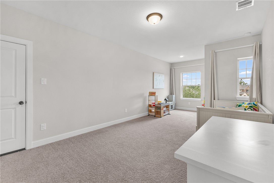 3632 Haskell Hollow Loop College Station, TX 77845 - Photo 29 of 42 an empty room with furniture and a window
