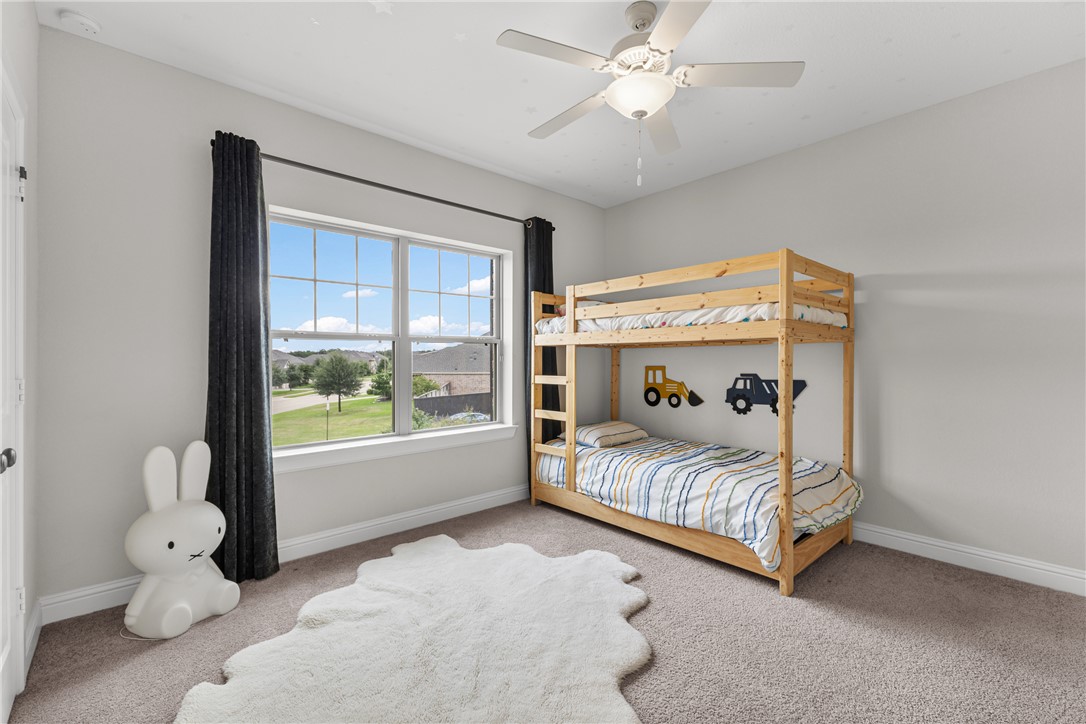 3632 Haskell Hollow Loop College Station, TX 77845 - Photo 31 of 42 a bedroom with a bed and a window