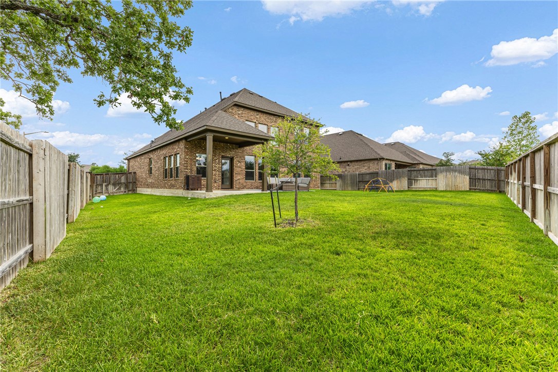 3632 Haskell Hollow Loop College Station, TX 77845 - Photo 35 of 42 a view of a house with a yard