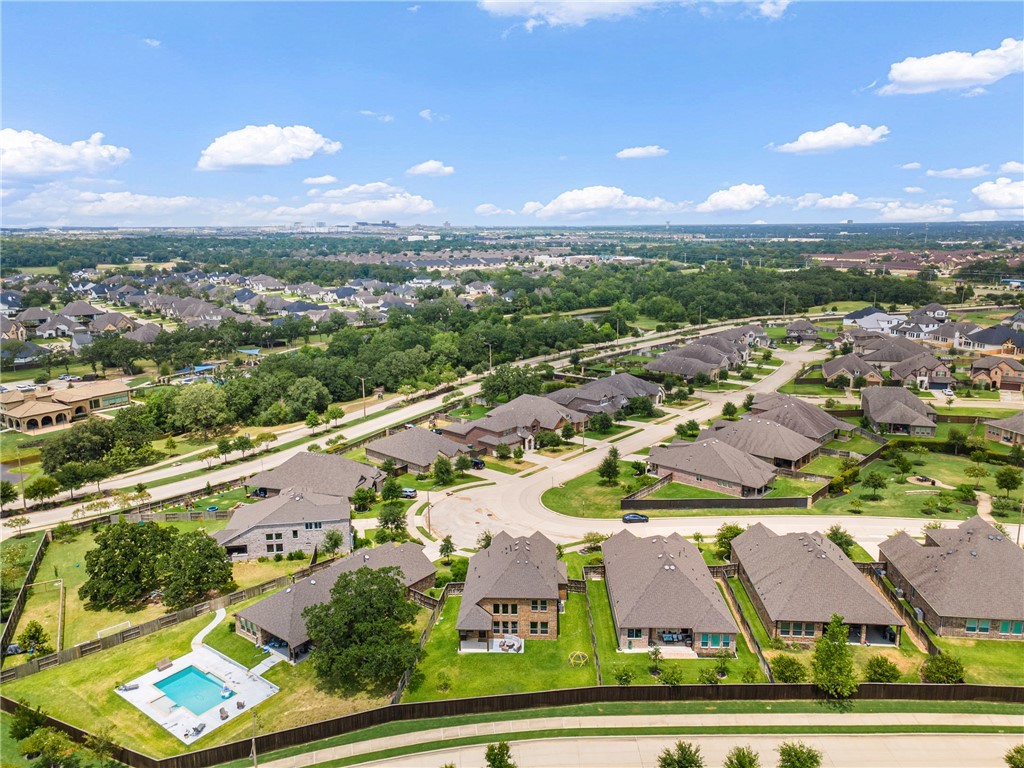 3632 Haskell Hollow Loop College Station, TX 77845 - Photo 38 of 42 an aerial view of residential houses with outdoor space and parking