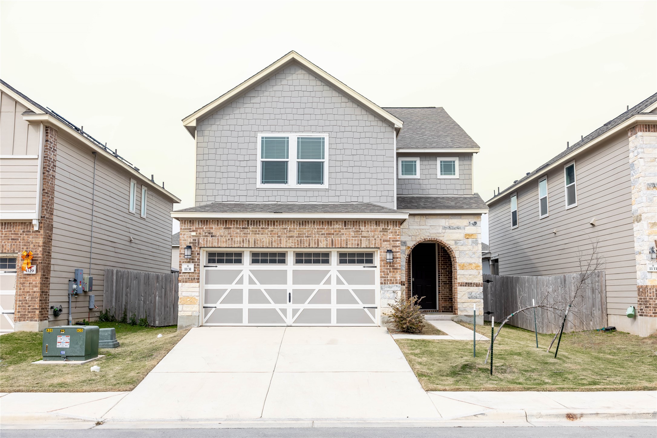 1131 Aronia Lane Georgetown, TX 78626 - Photo 1 of 1 a front view of a house with garden