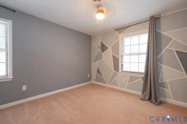 an empty room with windows