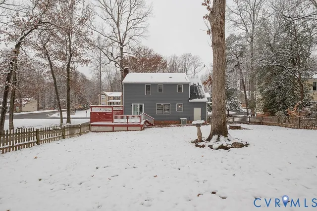 a view of backyard with a table and chairs
