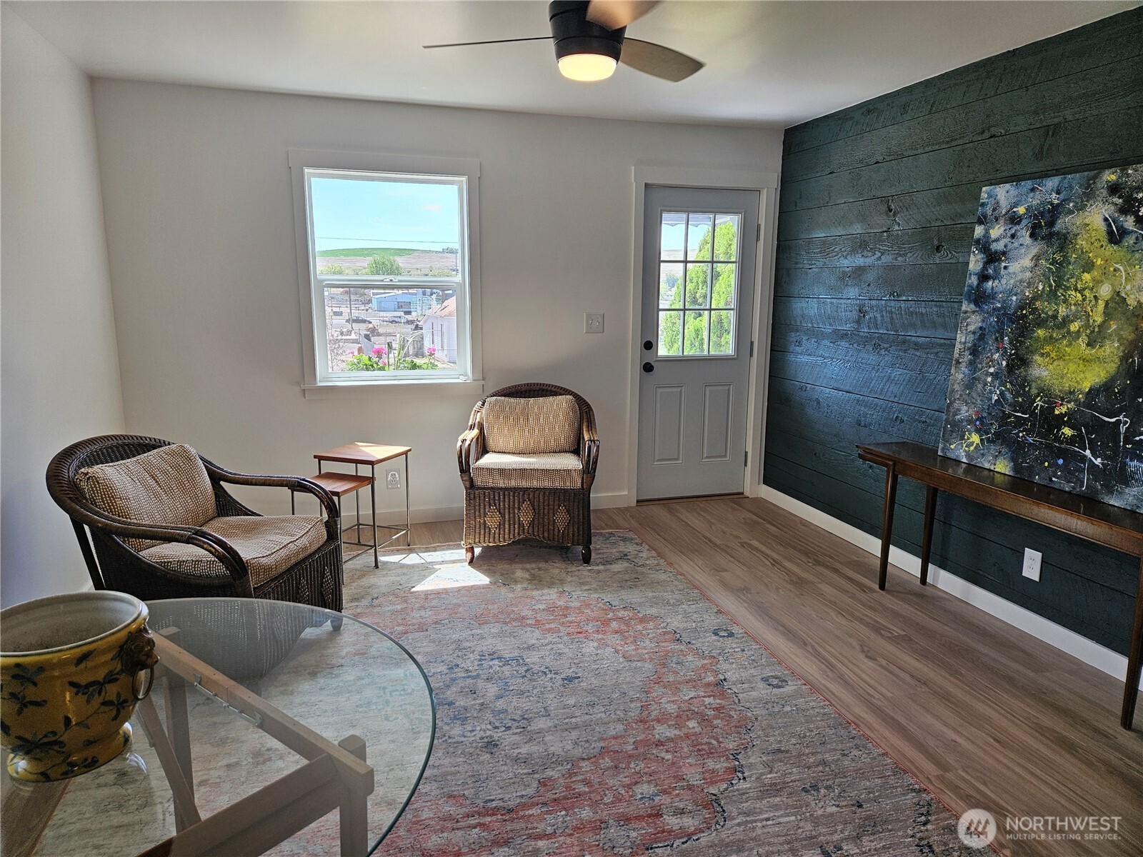 108 West 3rd Street Lind, WA 99341 - Photo 18 of 29 a living room with furniture and a rug
