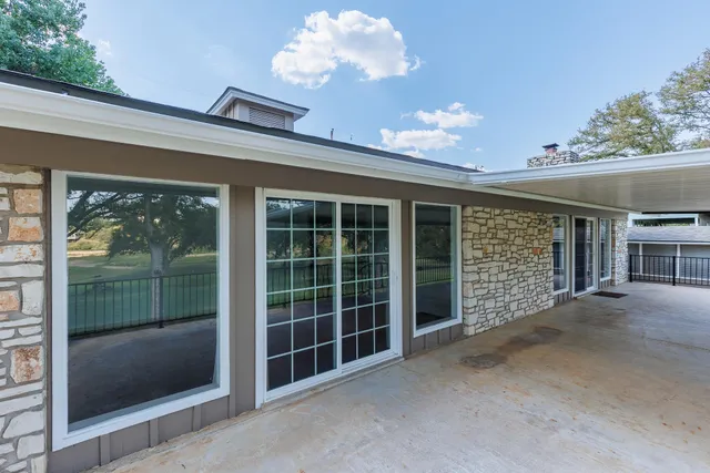 a view of a house with a large window