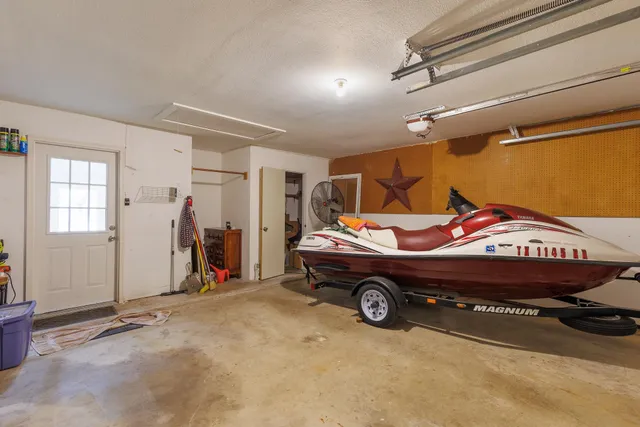 a living room with furniture and a outdoor space