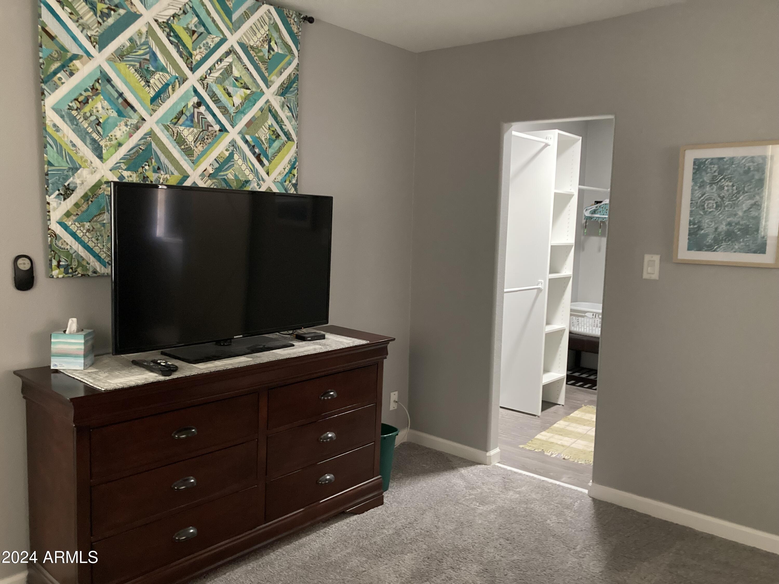 8145 East Pueblo Avenue Mesa, AZ 85208 - Photo 18 of 39 primary bedroom w-tv