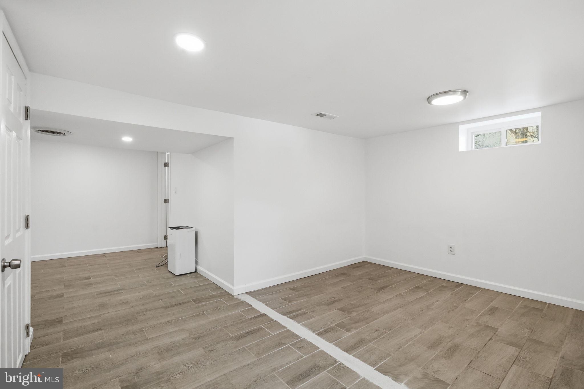 632 Durham Road Newtown, PA 18940 - Photo 26 of 37 a view of a room with wooden floor and white walls