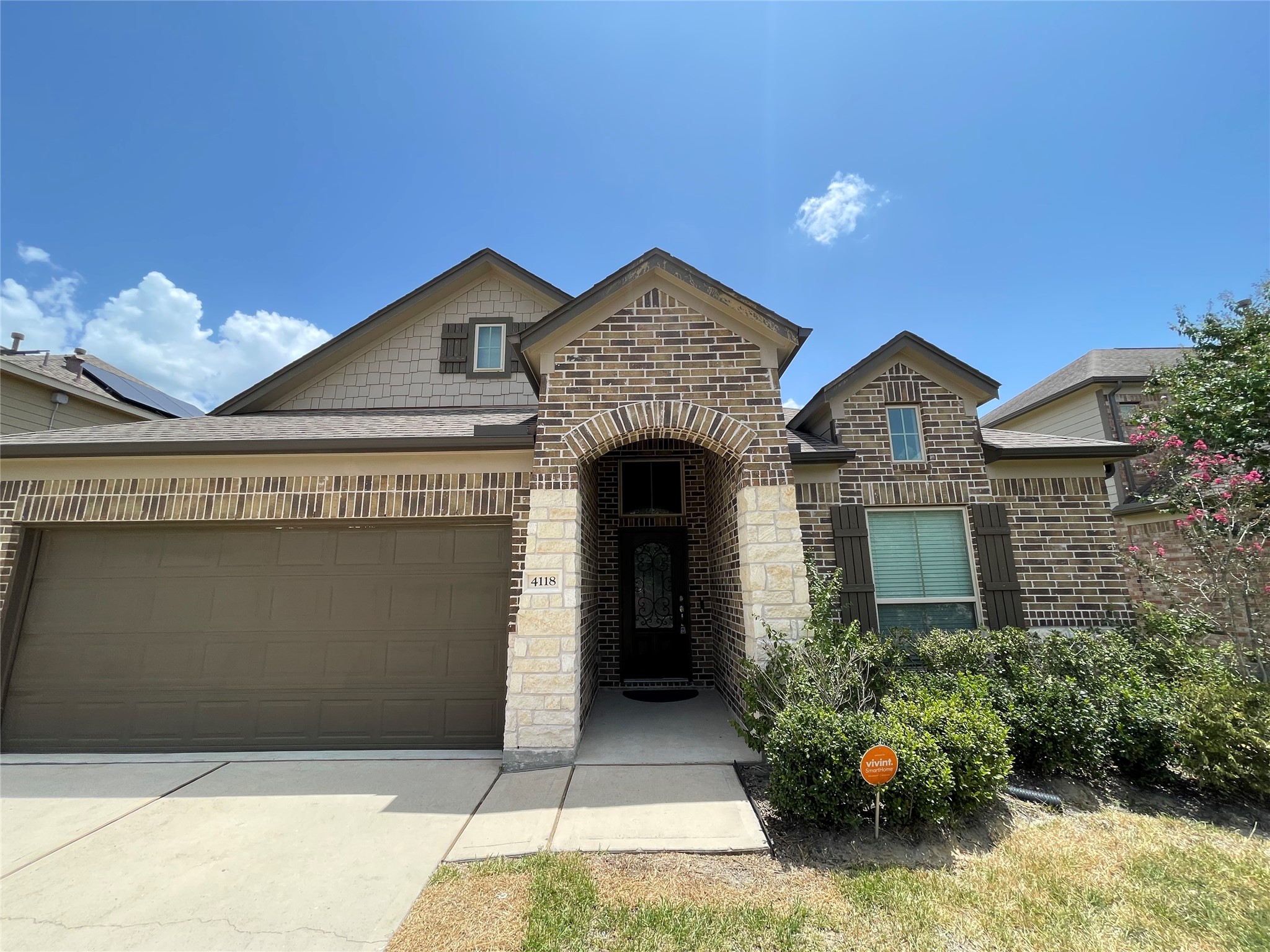 4118 Guild Meadows Drive Houston, TX 77084 - Photo 3 of 35 a front view of a house with entryway