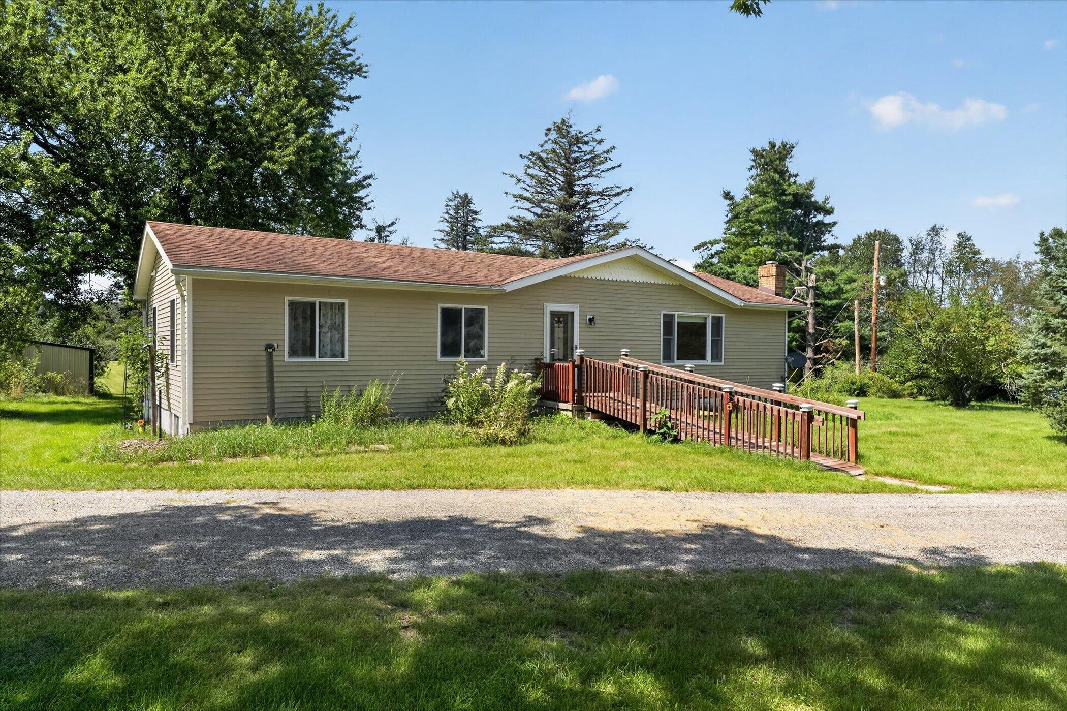 15601 Devonshire Pinckney, MI 48169 - Photo 2 of 33 02-15601-Devonshire-WindowStill-Photogra