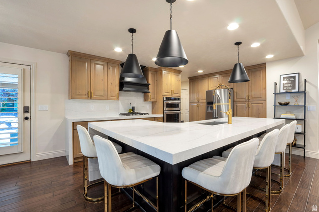 577 South Ridge Top Lane East North Salt Lake, UT 84054 - Photo 6 of 57 Gourmet kitchen centered around an oversized waterfall island with seating for family and guests.