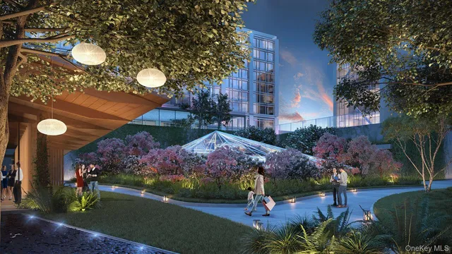 a view of a house with a yard and garden