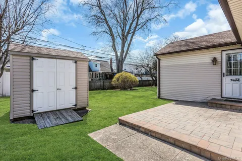 a view of a backyard with a garden