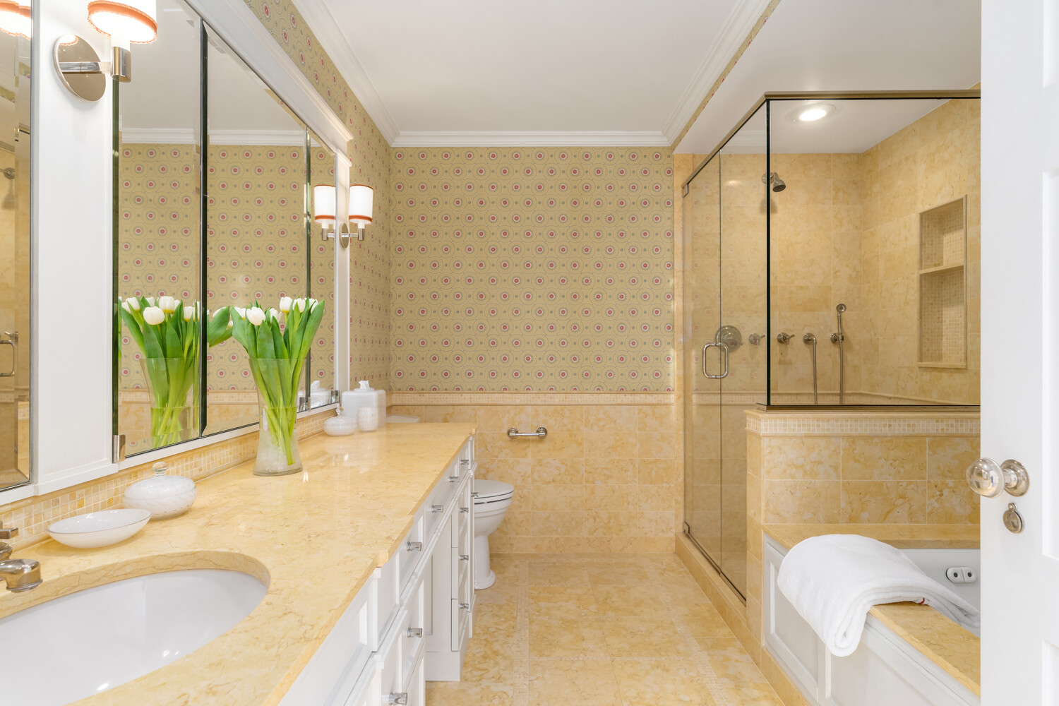 502 Park Avenue, Unit PH22 Manhattan, NY 10022 - Photo 14 of 19 a spacious bathroom with a tub shower and sink