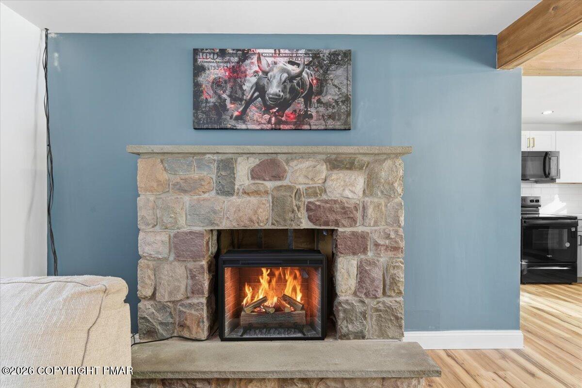 3279 Beech Ridge Drive Pocono Summit, PA 18346 - Photo 14 of 37 a room with a fireplace