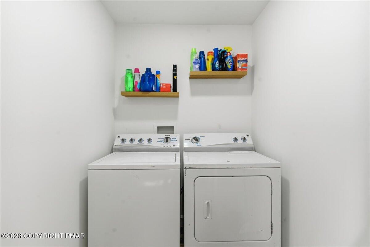 3279 Beech Ridge Drive Pocono Summit, PA 18346 - Photo 24 of 37 a utility room with dryer and washer