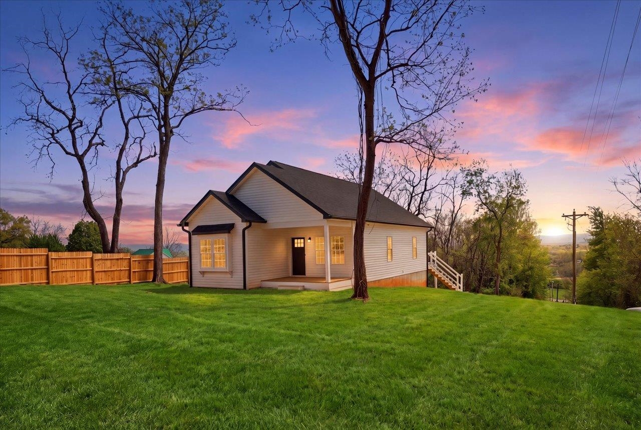 a view of a house with a big yard