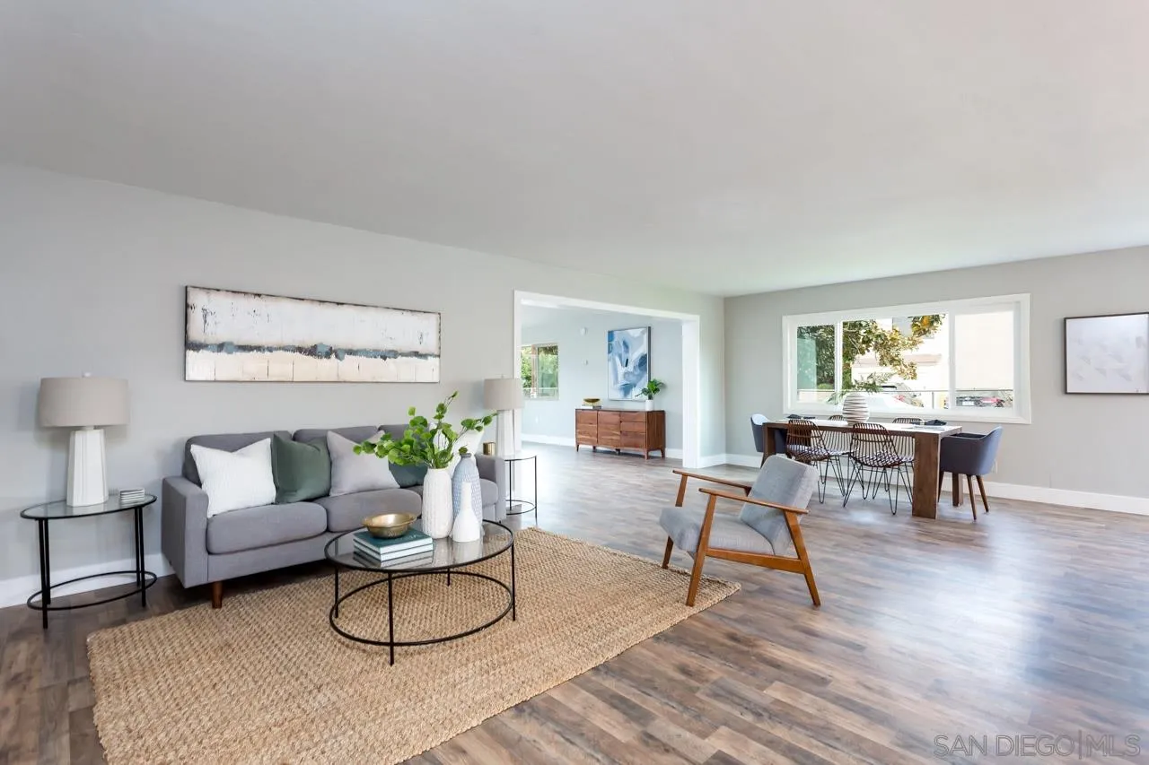 12055 Royal Road El Cajon, CA 92021 - Photo 1 of 34 a living room with furniture and a table