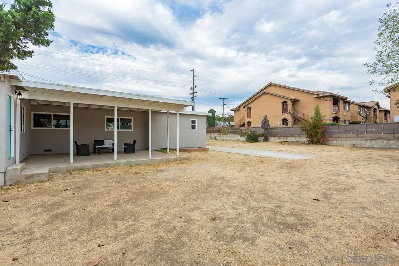 12055 Royal Road El Cajon, CA 92021 - Photo 31 of 34 a view of a house with a yard