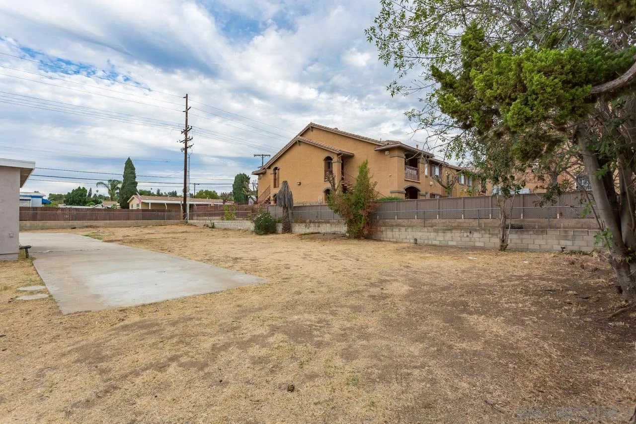 12055 Royal Road El Cajon, CA 92021 - Photo 34 of 34 a front view of a house with a yard