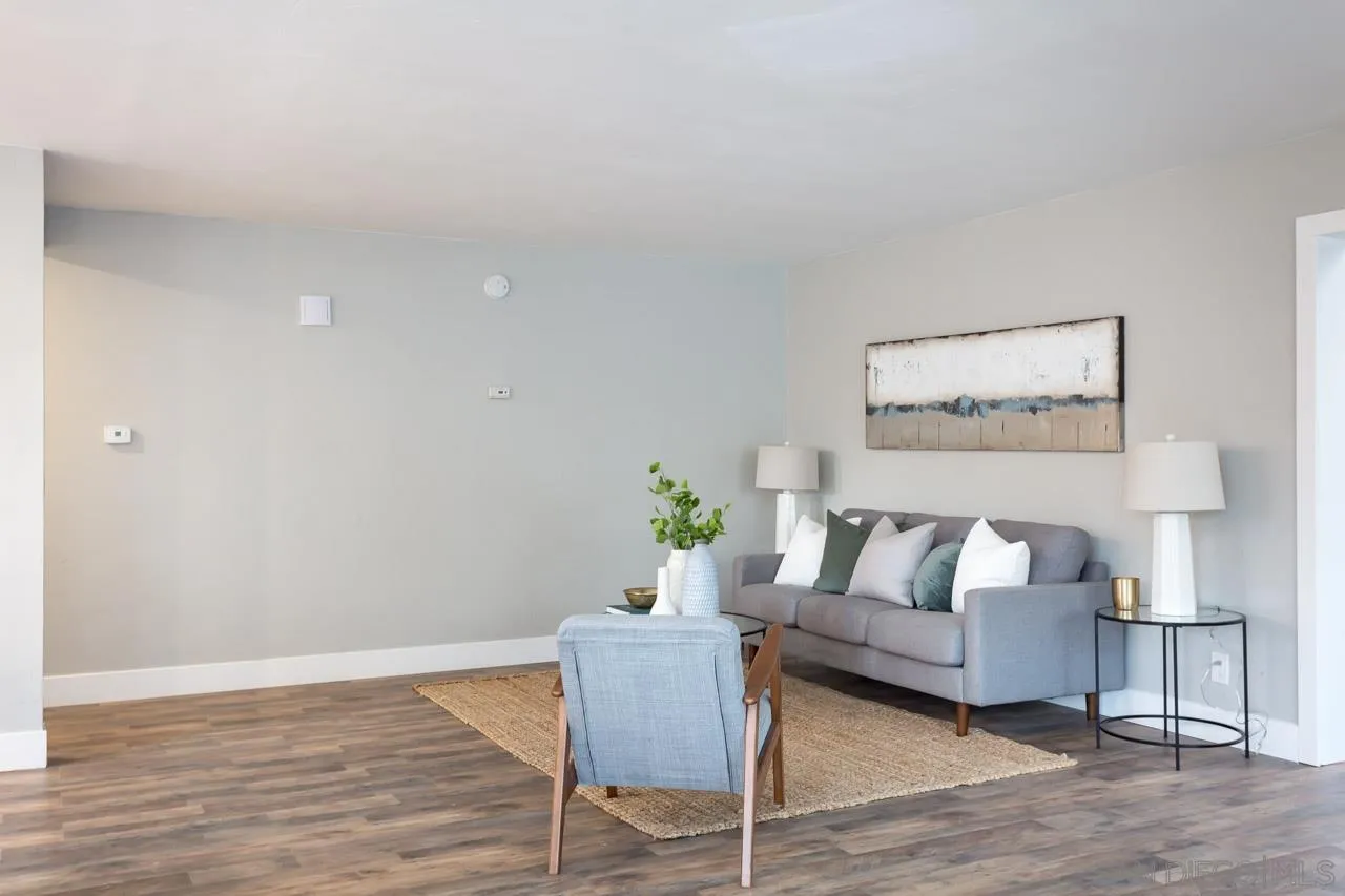 12055 Royal Road El Cajon, CA 92021 - Photo 4 of 34 a living room with furniture and wooden floor