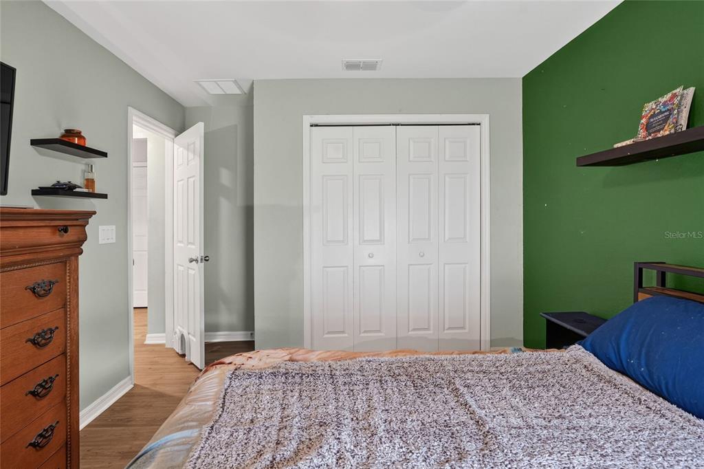 6360 Gardner Road Lakeland, FL 33813 - Photo 27 of 47 a bedroom with a bed and a dresser