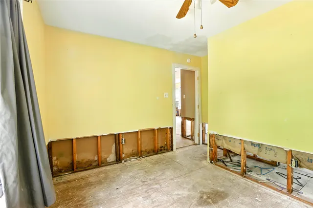 a view of a balcony with furniture