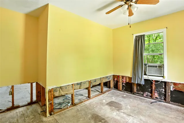 a view of a balcony with furniture