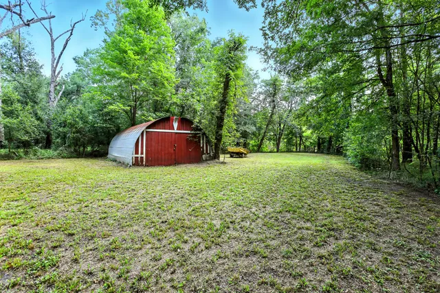 a fire hydrant in the middle of a field