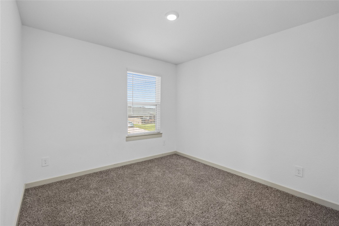 29847 Reagans Ranch Drive Katy, TX 77494 - Photo 26 of 36 an empty room with a window