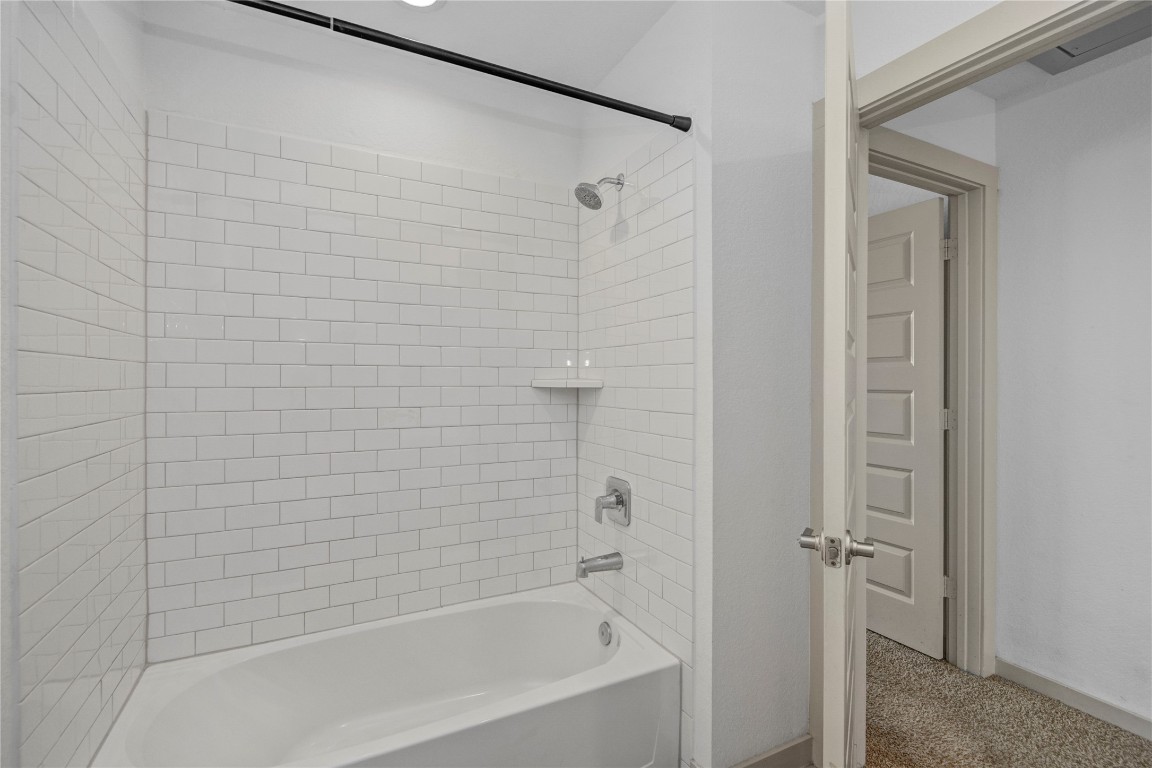 29847 Reagans Ranch Drive Katy, TX 77494 - Photo 31 of 36 a bathroom with a bathtub