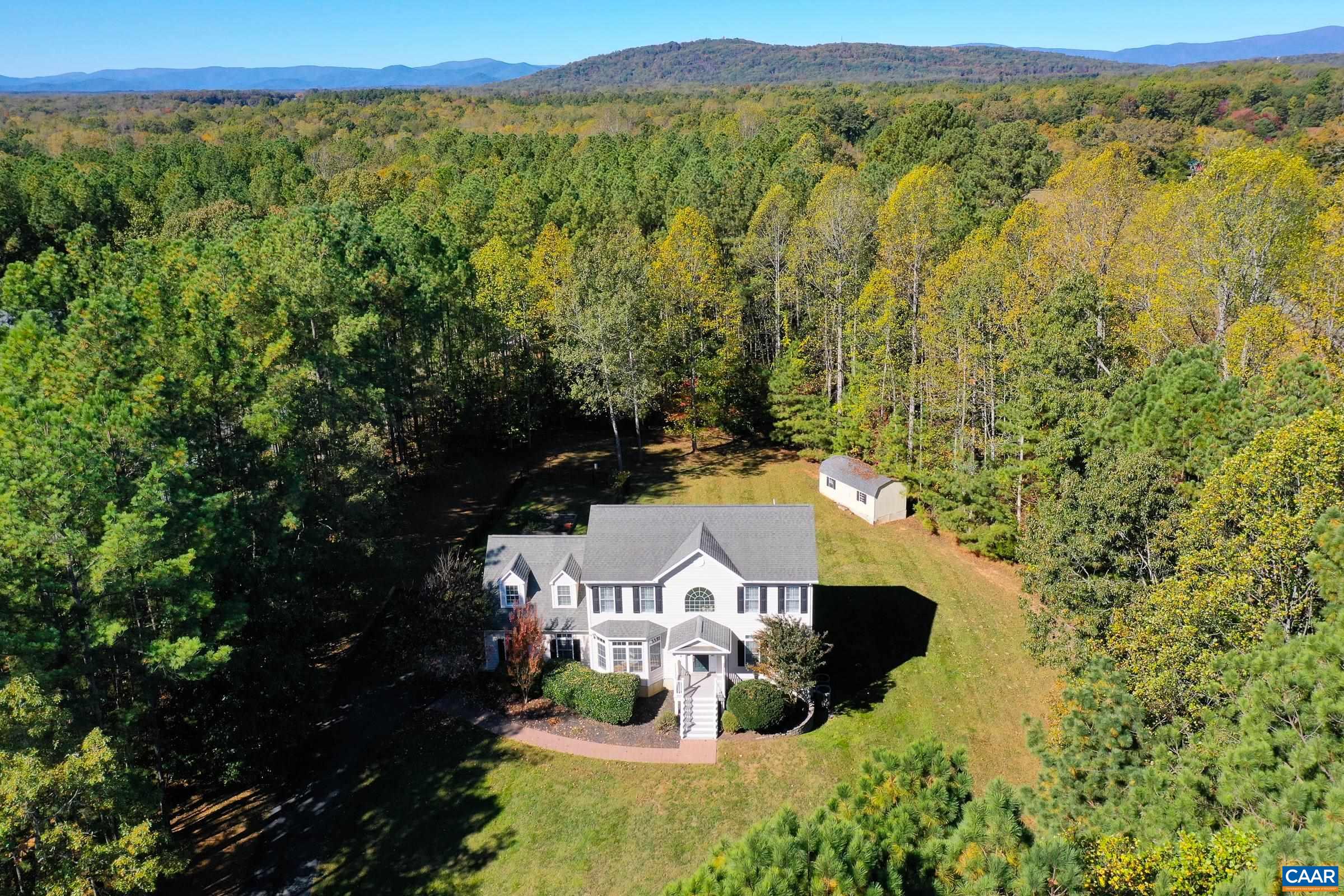 Beautiful private yard with storage shed.
