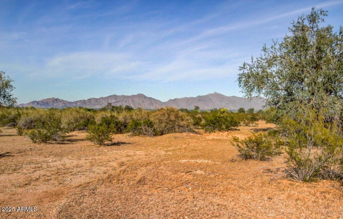 18349 West Mewes Road Buckeye, AZ 85326 - Photo 7 of 14 a view of lake and mountain