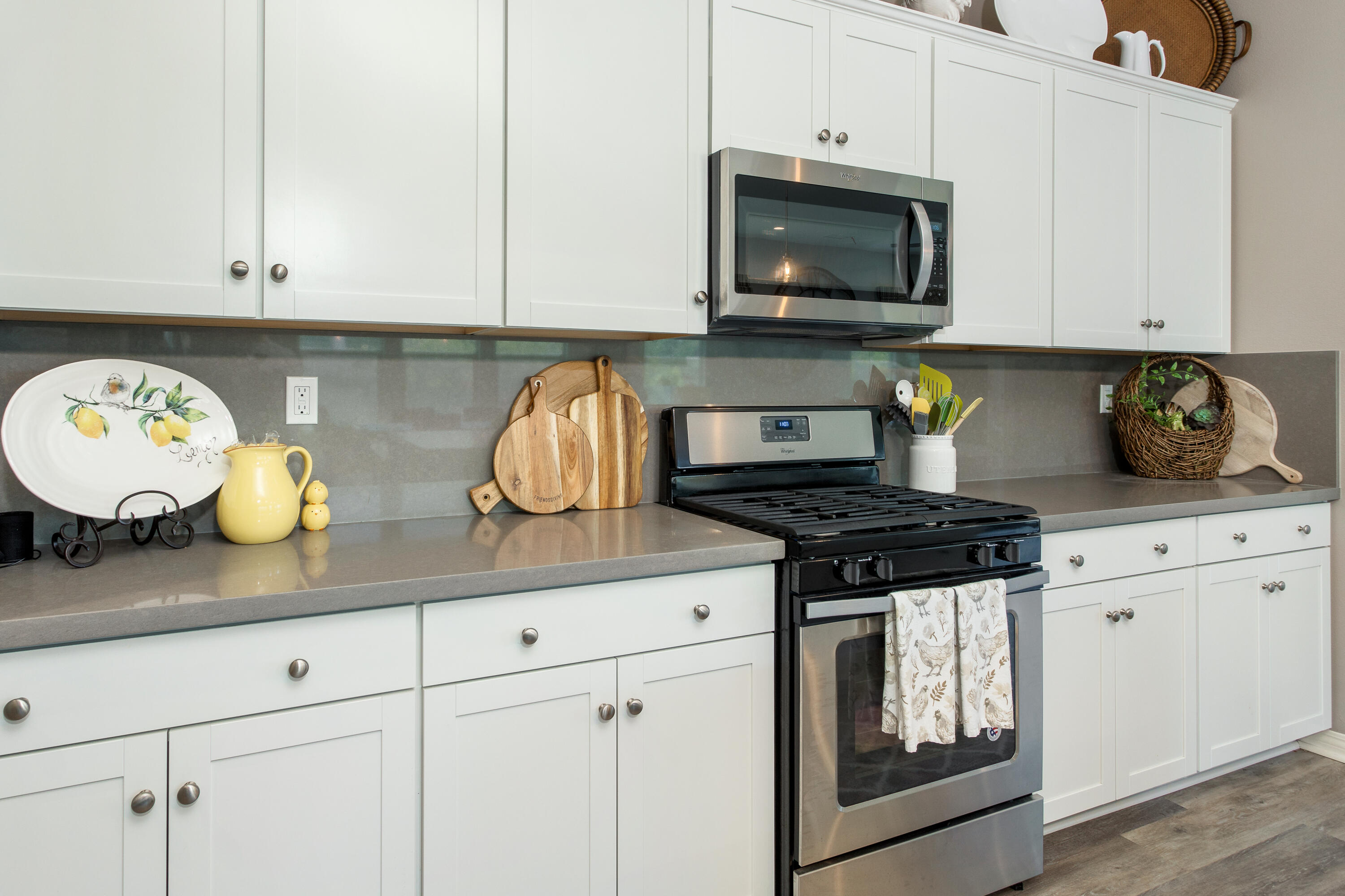 61 Syrah Rancho Mirage, CA 92270 - Photo 20 of 61 a kitchen with stainless steel appliances granite countertop white cabinets and a stove a oven with granite countertops