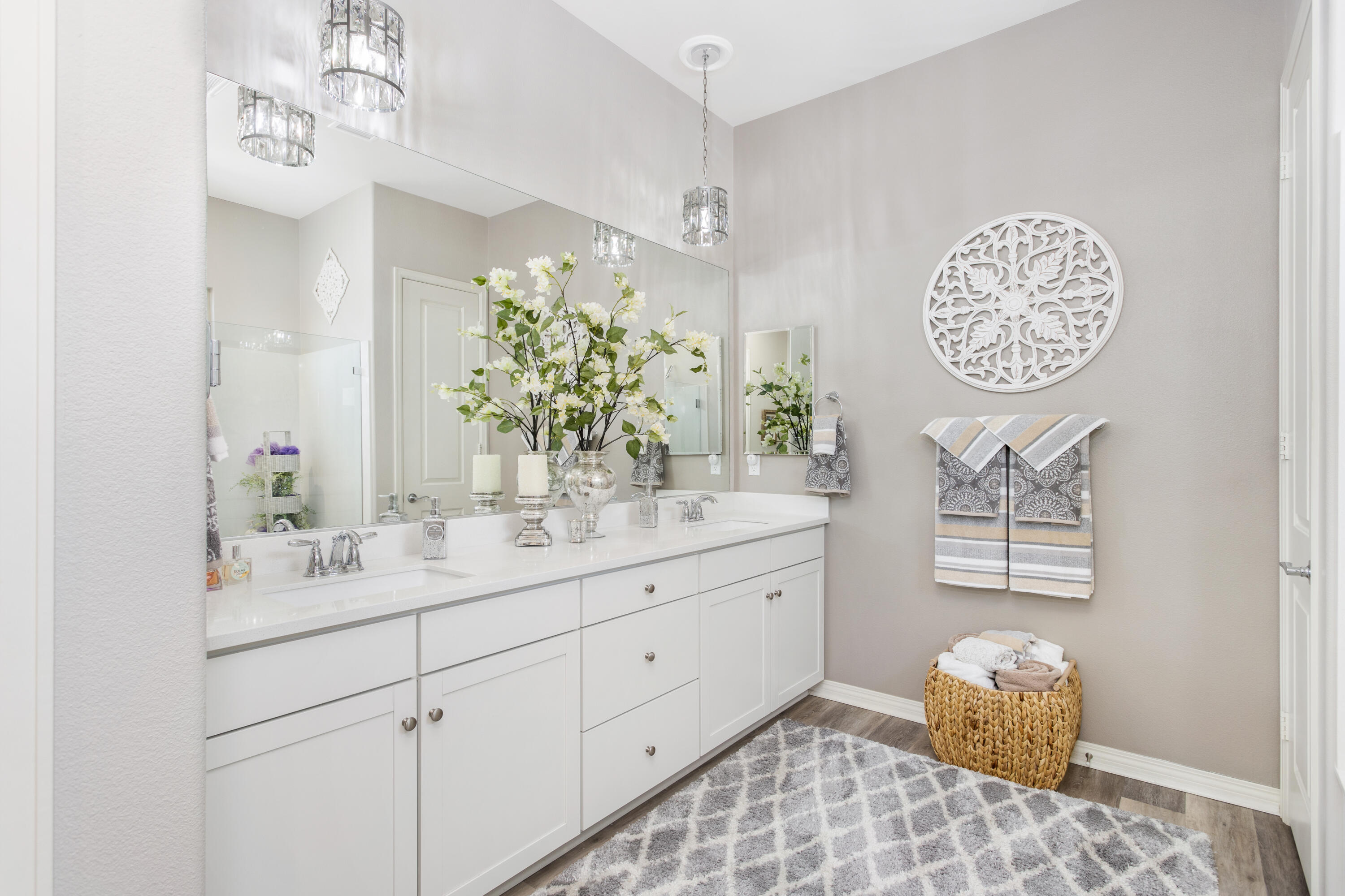 61 Syrah Rancho Mirage, CA 92270 - Photo 25 of 61 a bathroom with a sink mirror and vanity