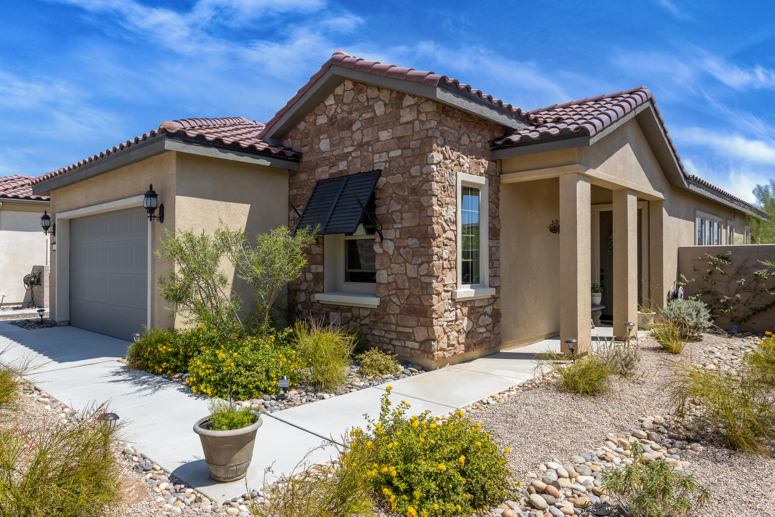 61 Syrah Rancho Mirage, CA 92270 - Photo 3 of 61 a front view of a house with a yard