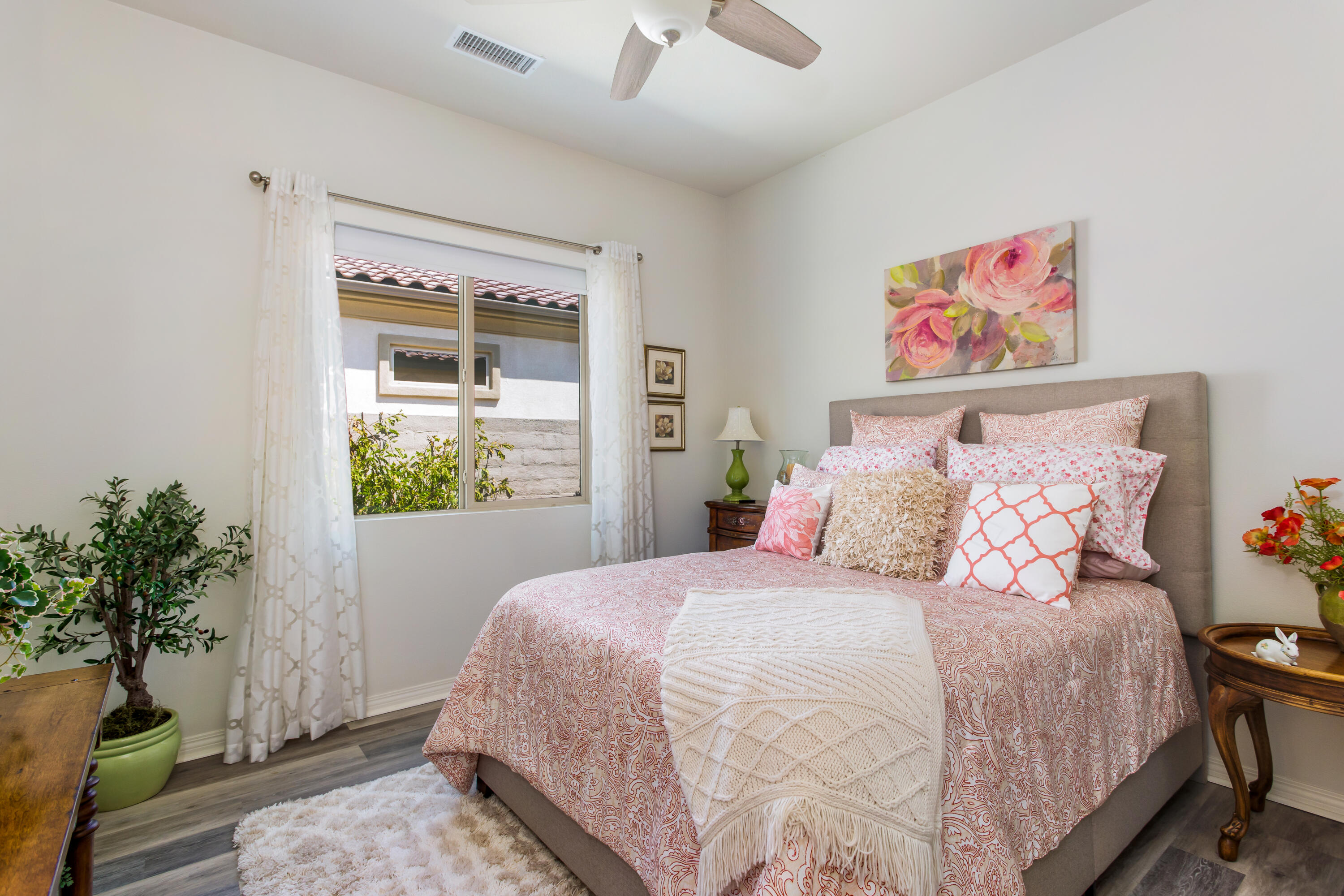 61 Syrah Rancho Mirage, CA 92270 - Photo 35 of 61 a bedroom with bed and a potted plant