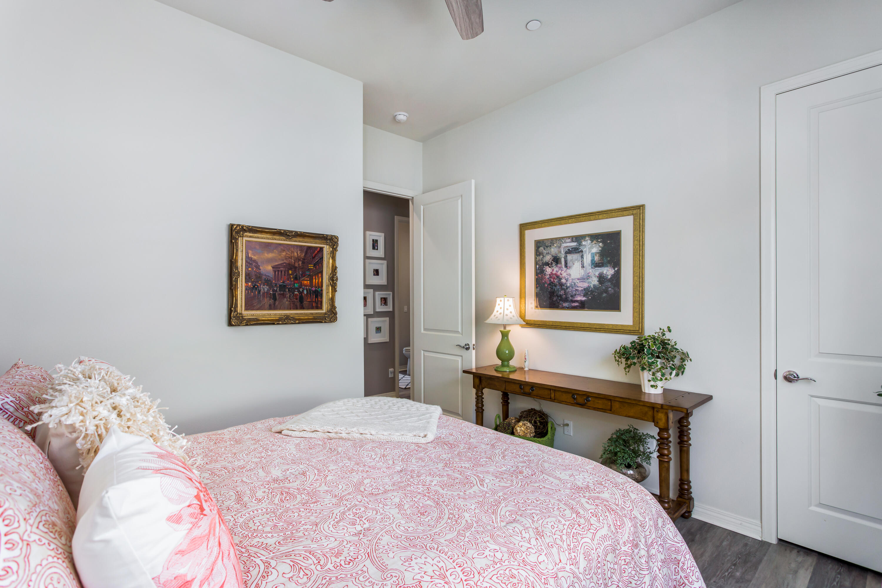 61 Syrah Rancho Mirage, CA 92270 - Photo 37 of 61 a bedroom with a bed and a table in it