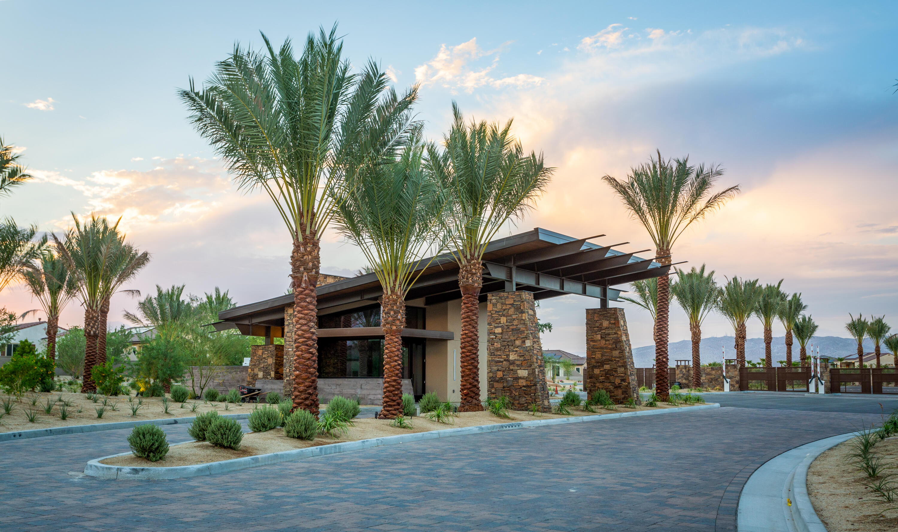 61 Syrah Rancho Mirage, CA 92270 - Photo 49 of 61 a front view of a house with a garden
