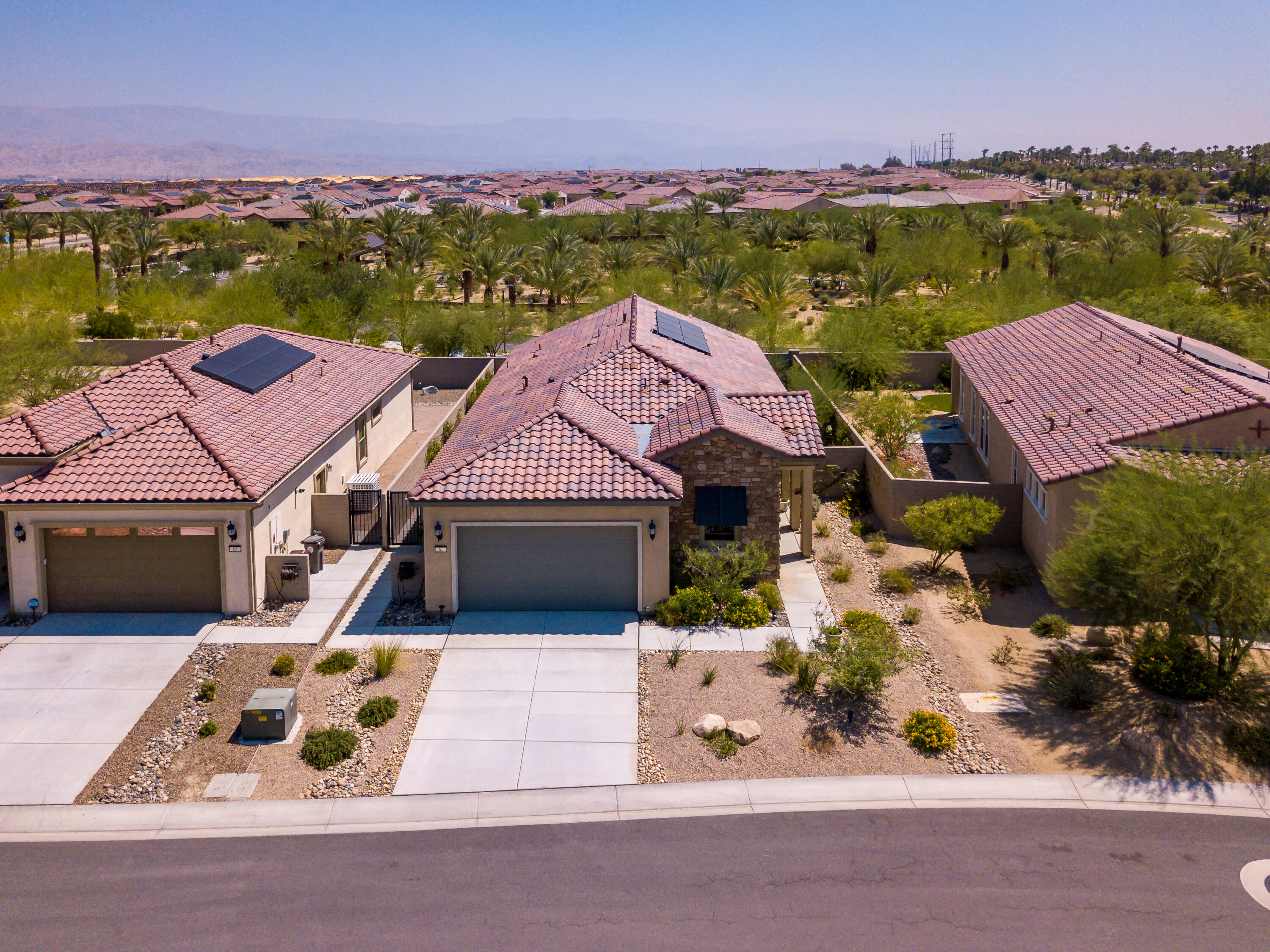 61 Syrah Rancho Mirage, CA 92270 - Photo 58 of 61 an aerial view of multiple houses with a yard