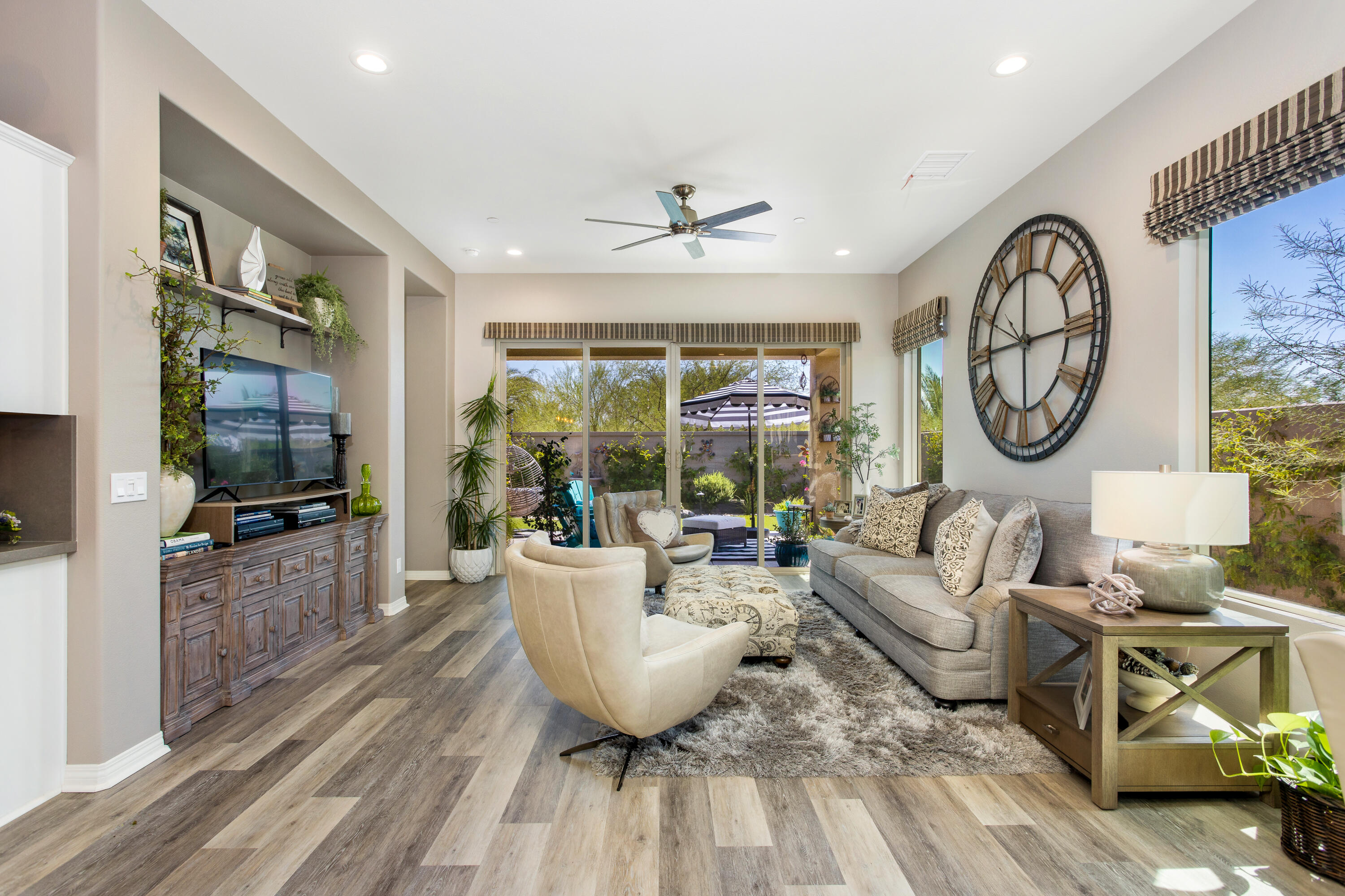 61 Syrah Rancho Mirage, CA 92270 - Photo 10 of 61 a living room with furniture a fireplace and a flat screen tv