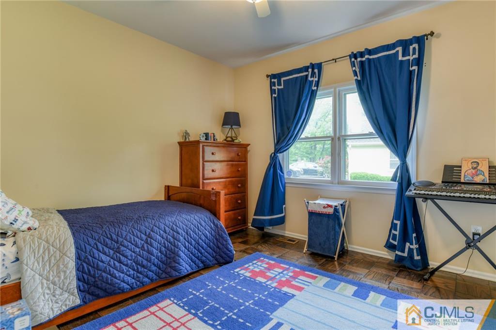 3 Spruce Lane Princeton, NJ 08540 - Photo 24 of 34 a bedroom with a bed and a window