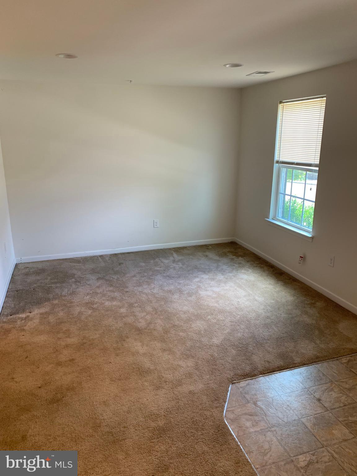 652 East Chestnut Street Souderton, PA 18964 - Photo 2 of 20 an empty room with windows