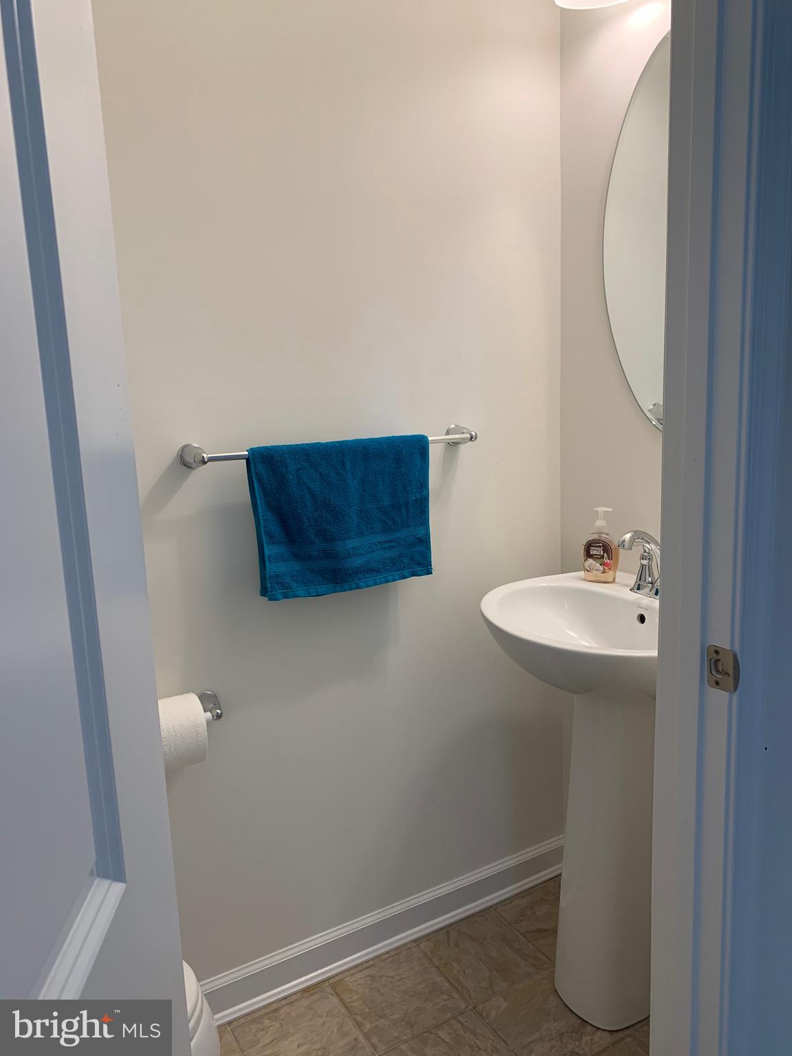 652 East Chestnut Street Souderton, PA 18964 - Photo 3 of 20 a bathroom with a sink and mirror