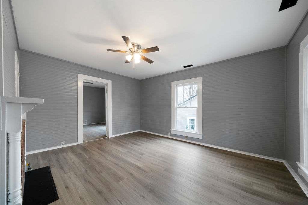 425 North Marble Street Rockmart, GA 30153 - Photo 12 of 26 a view of empty room with wooden floor and fan
